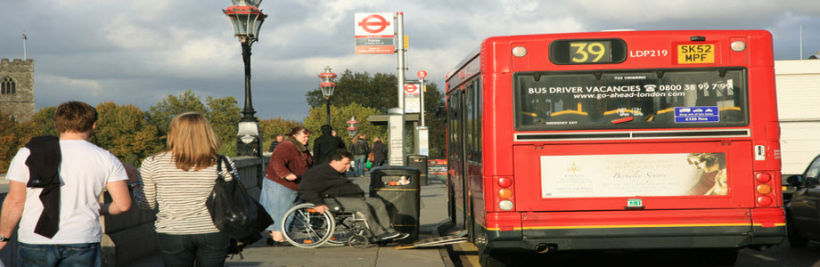 A disabled person trying to access public transport in London 