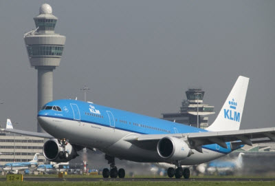 KLM airplane landing at Amsterdam Schiphol airport
