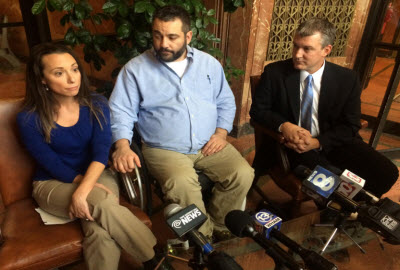 Ashley and Jerremy Lorch and their lawyer at a news conference